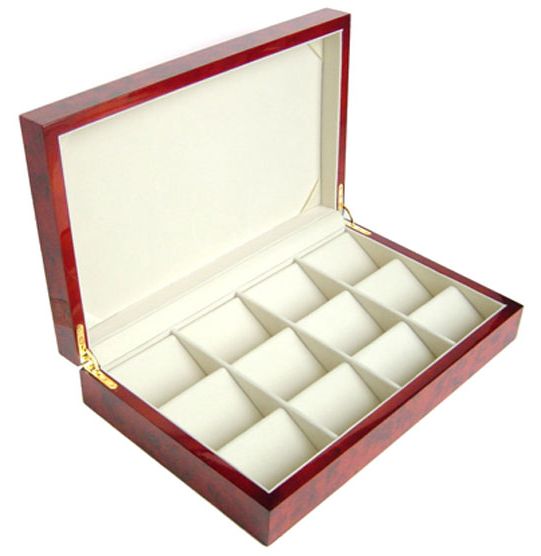Solid wood 12-watch display case open — showing 12 individual cream cushioned compartments in a piano-gloss case with gold hinges