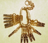 Set of pocket watch winding keys on a split ring